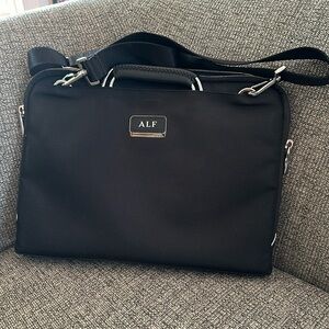 Tumi Slim Brief with padded compartment - Black with Black Leather